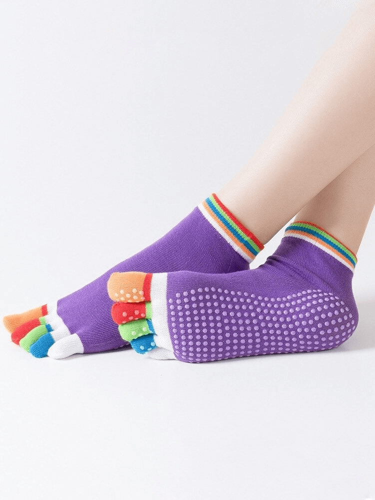 Purple five-toe socks with rainbow trim and non-slip grip for yoga or sports activities.